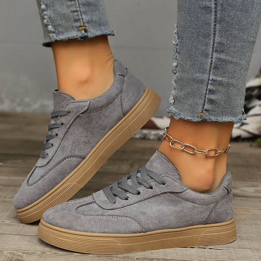 A pair of women's round-toe lace-up casual sneakers with textured grey fabric and a tan rubber sole.