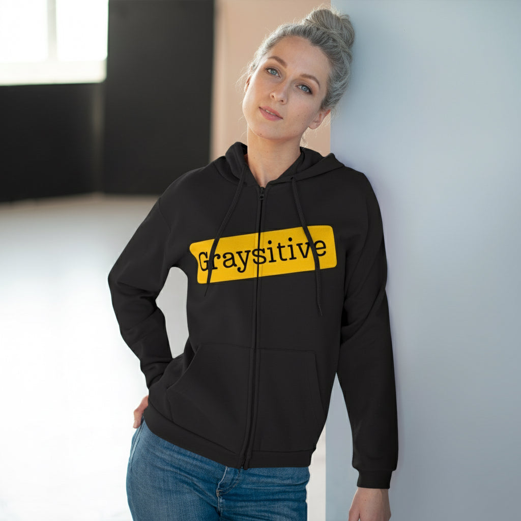 Unisex Graysitive hooded zip sweatshirt in yellow, perfect for a casual streetwear outfit.