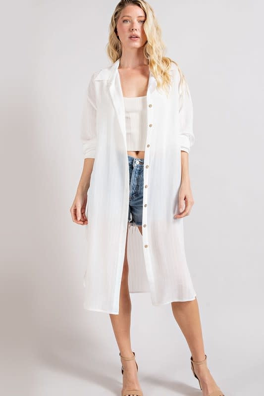 A stylish white button-down long jacket for women, designed for versatile layering.