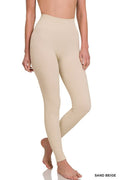 Model wearing Ribbed Seamless High Waisted Leggings in Sand Beige from Boutique 23