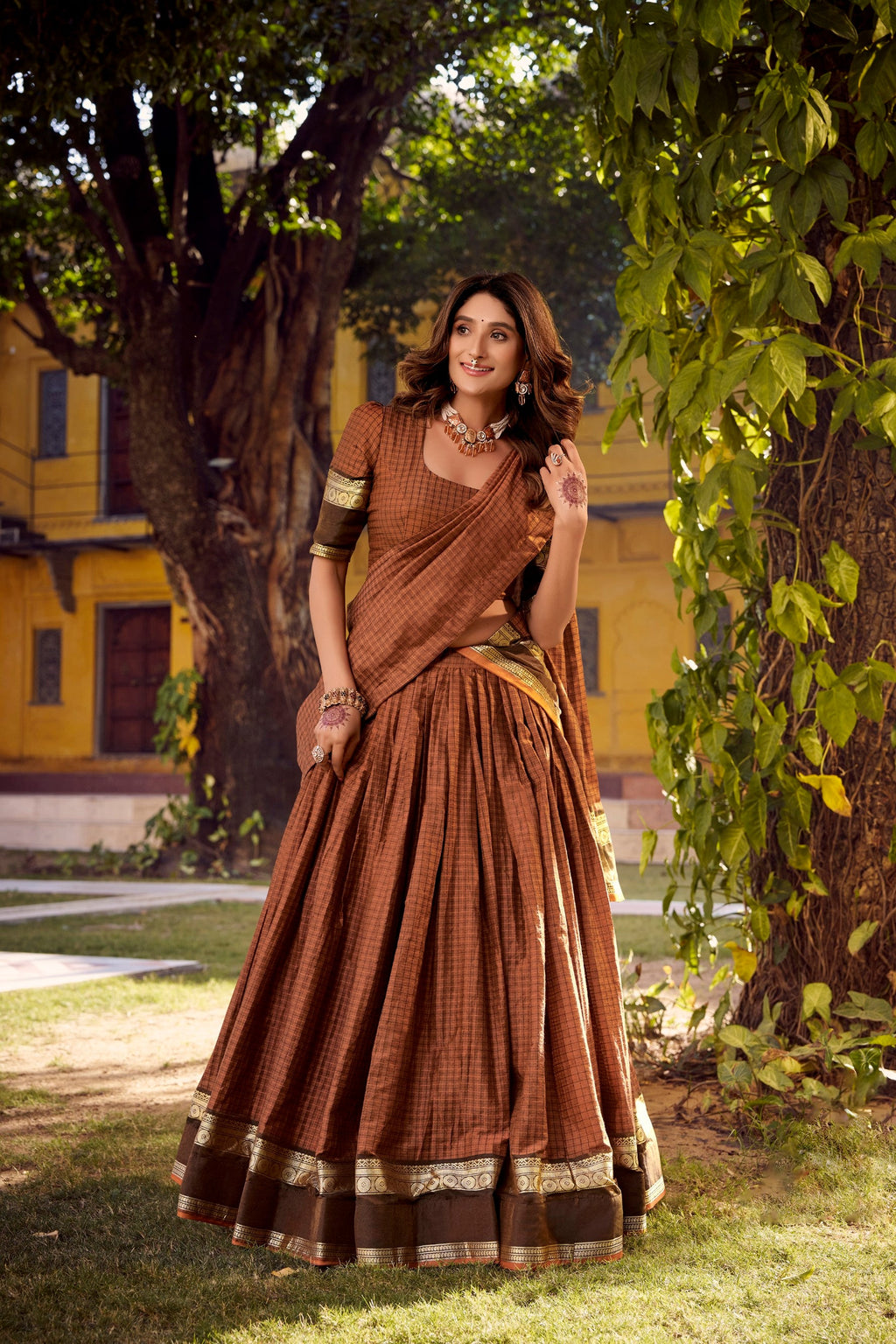 Brown Chettinad cotton lehenga choli with zari weaving and chex pattern details