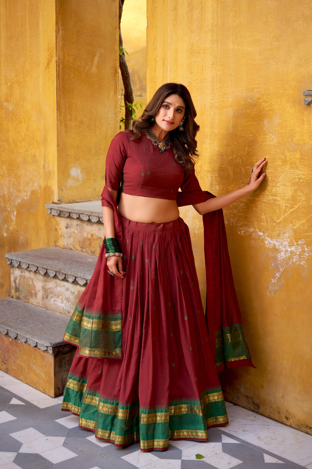 Maroon Pure Chanderi lehenga choli set with gold zari weaving work and matching dupatta