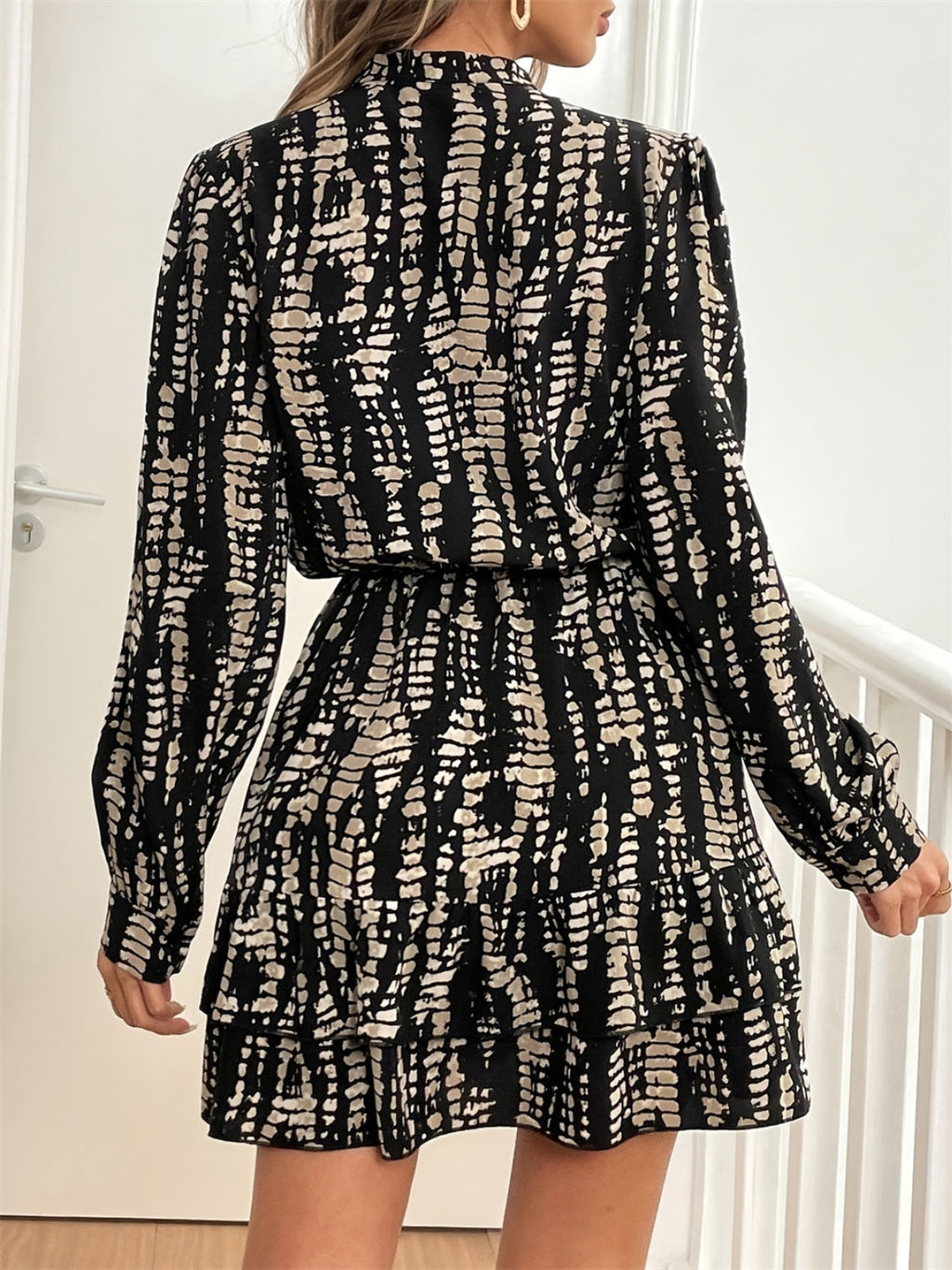 Abstract Print Long Sleeve Mini Dress in Black and Beige