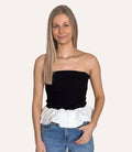 Black ribbed knit tube top featuring a voluminous bubble peplum hem and a fitted bodice.