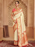 Off white silk blend saree featuring a contrast pink blouse