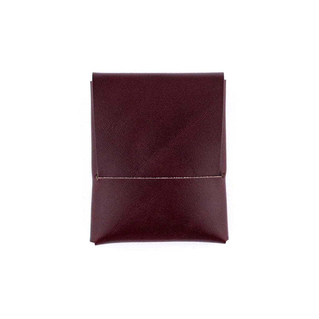 The Franklin minimalist wallet in burgundy full-grain leather, front view.