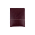 The Franklin minimalist wallet in burgundy full-grain leather, front view.