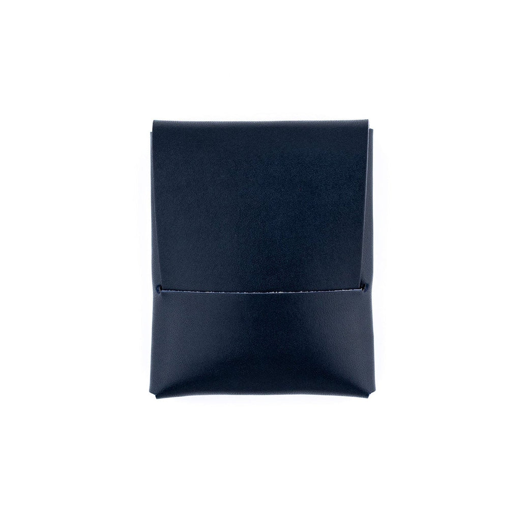 The Franklin minimalist wallet in navy full-grain leather, front view.