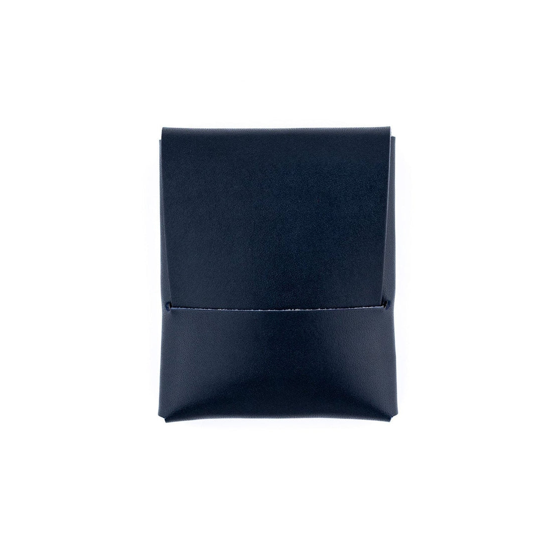 The Franklin minimalist wallet in navy full-grain leather, front view.