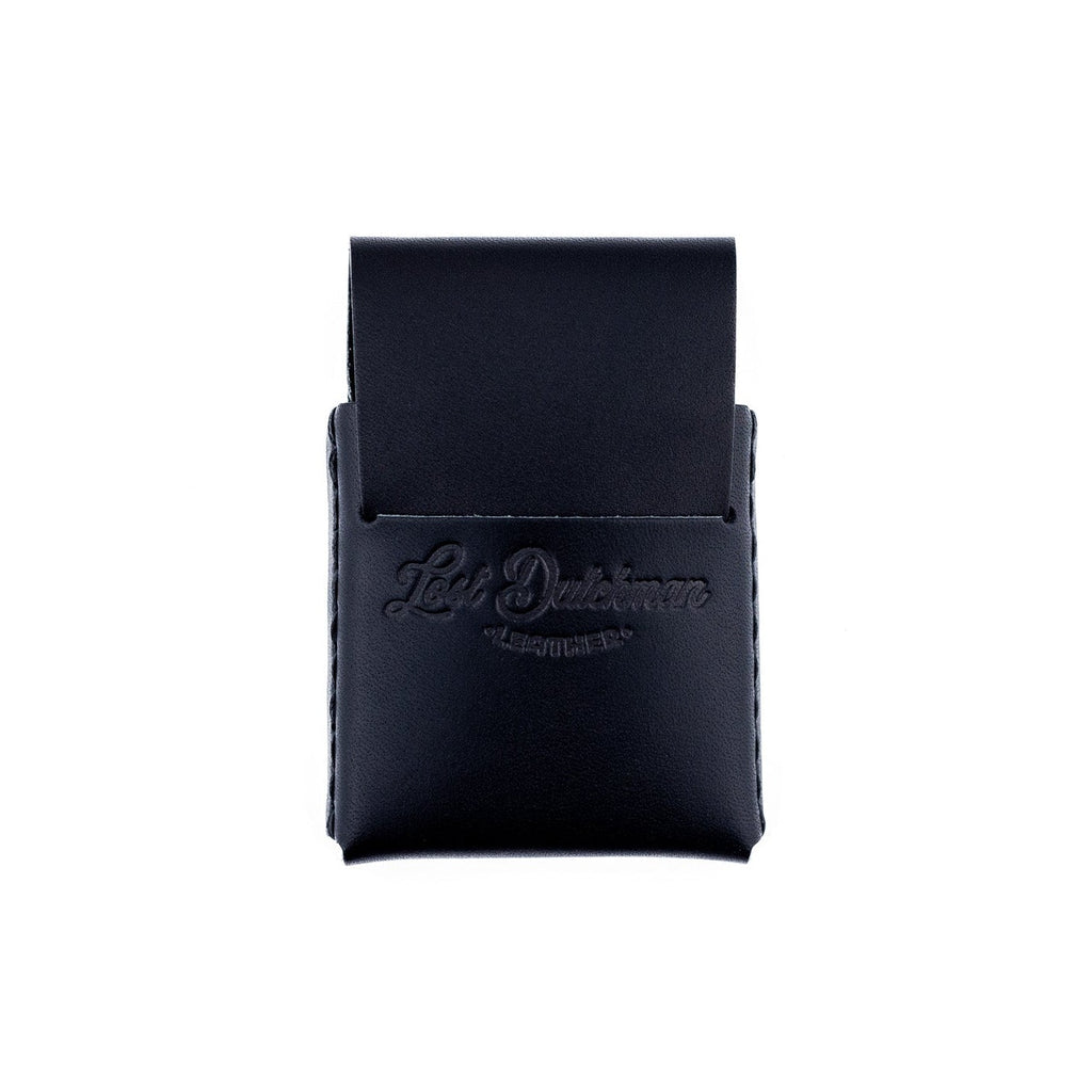 Black Thin Finn full-grain leather card holder showing slim profile and hand-stitched Tiger Thread detail.