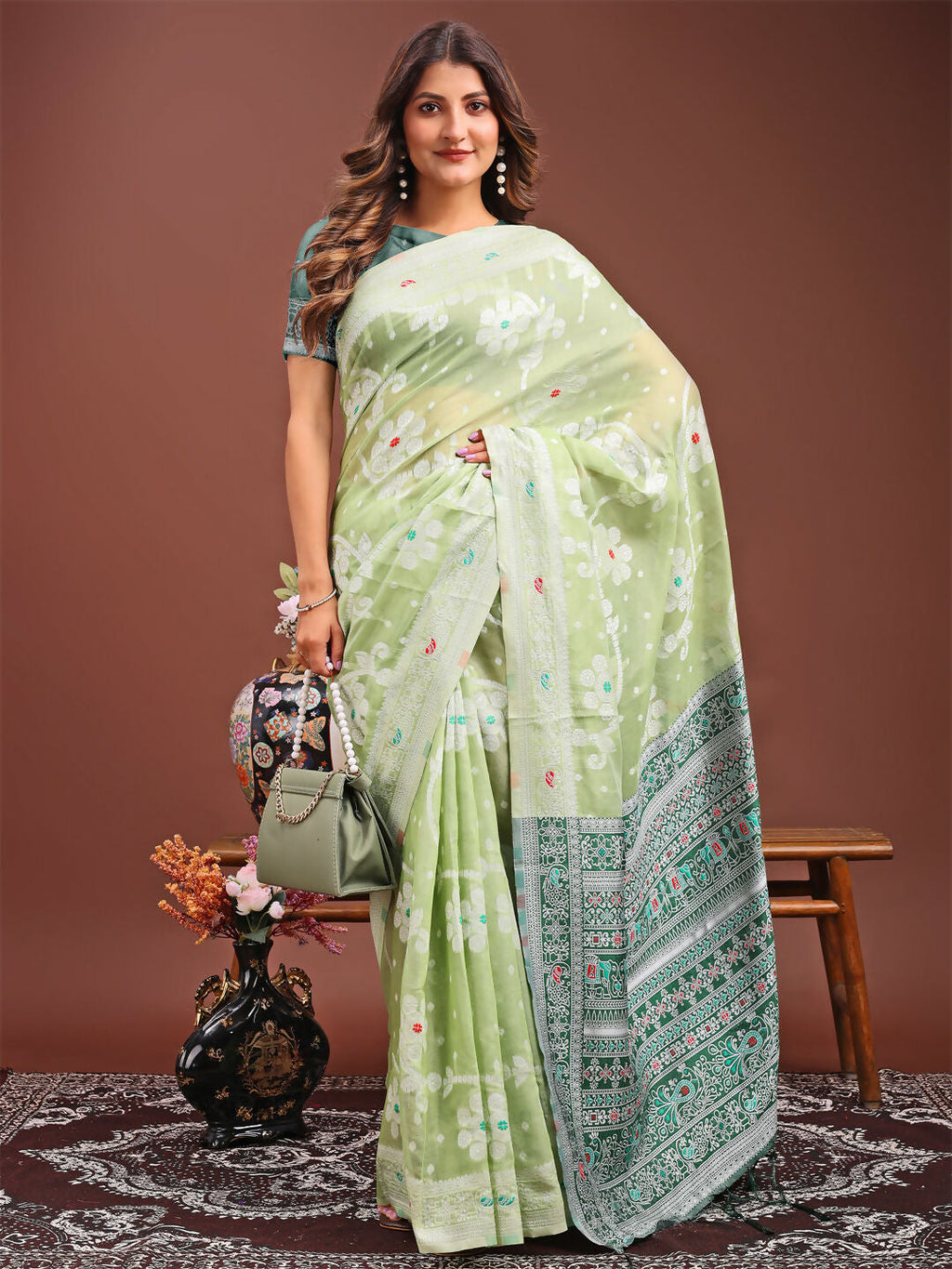 Anaya Light Green Linen Cotton Saree with matching blouse piece draped elegantly.