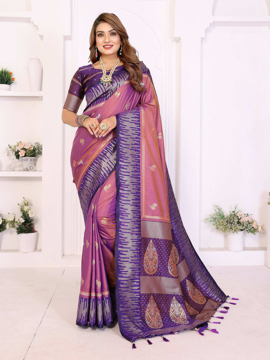 Aastha Fashion purple South soft silk saree with traditional zari weaving work