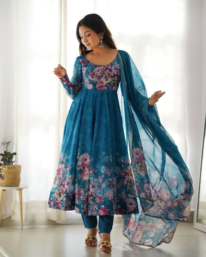 Rama colored organza kurta set with intricate sequin embroidery and a soft cotton bottom.