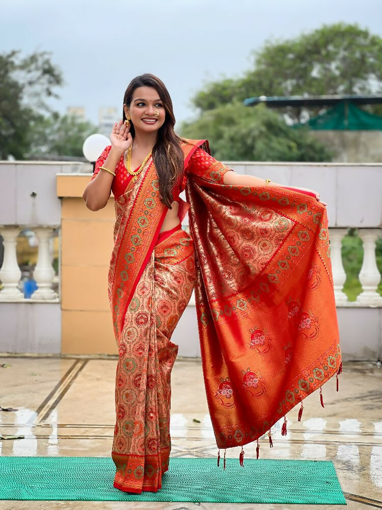 Red soft Kanjivaram silk saree with intricate Zari and Meenakari details