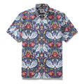 Short sleeve button-down shirt with vintage blue, red, and white bird and botanical print