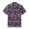 Men wearing a navy blue Hawaiian shirt with an orange and white Chinese phoenix and peony print.