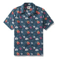 Men's teal Hawaiian shirt with crane and floral print in red, white, and yellow.