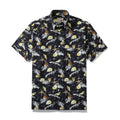 Vintage Hawaiian shirt with tropical conch shells on a black, yellow, and white background.