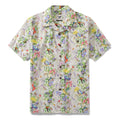 Men wearing a vibrant floral Hawaiian shirt with hummingbirds and a camp collar