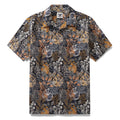Tropical Hawaiian shirt featuring animal-patterned leaves in black, mustard-yellow, and white.
