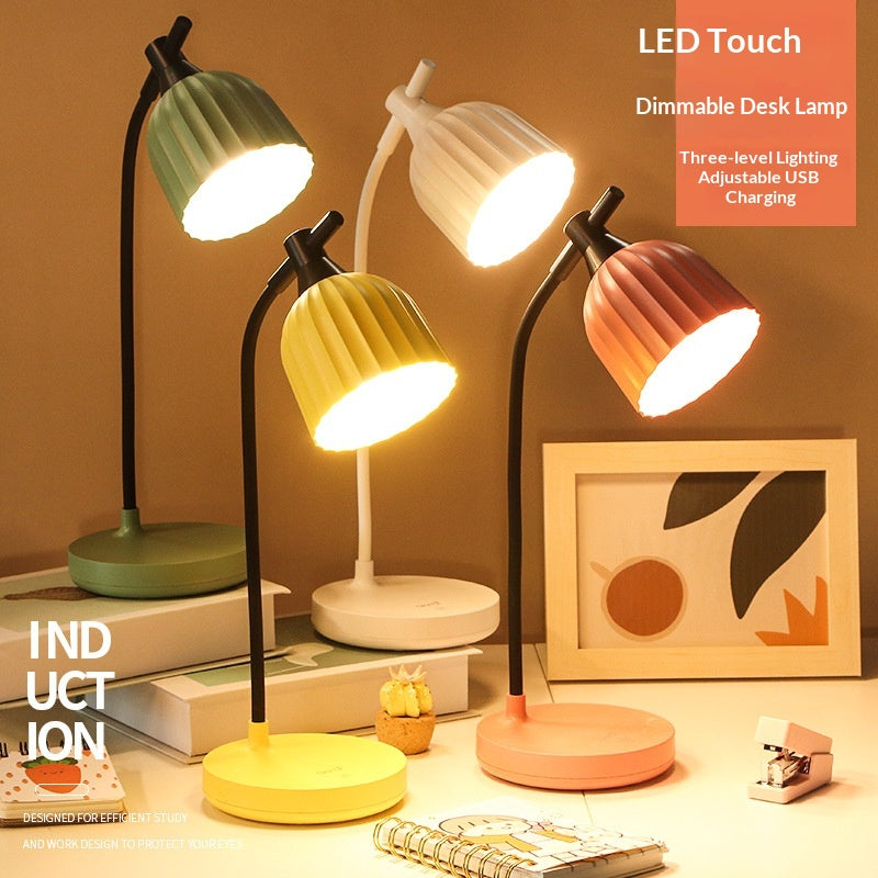 Foldable, touch-activated rechargeable LED desk lamp in a modern style