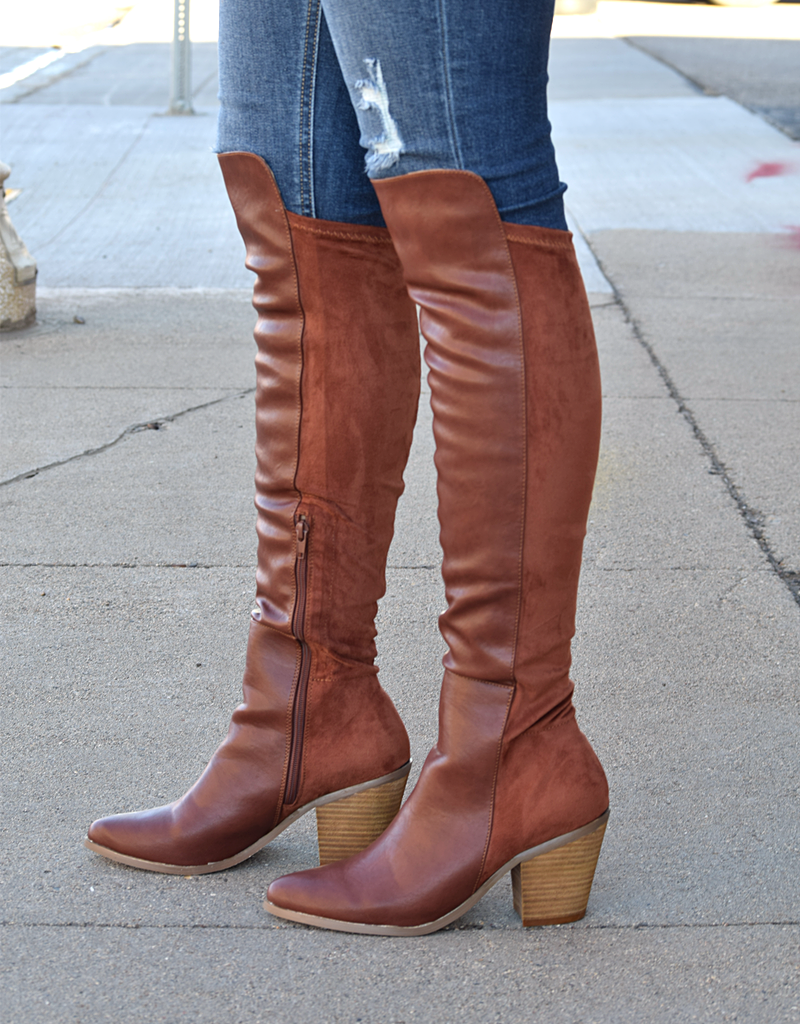 Side view of Orson Tall Boots featuring a 2.5 inch heel in a sleek, classic design.