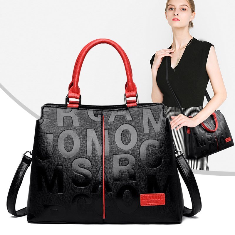 Spacious monogram print shoulder bag for women with casual luxury design