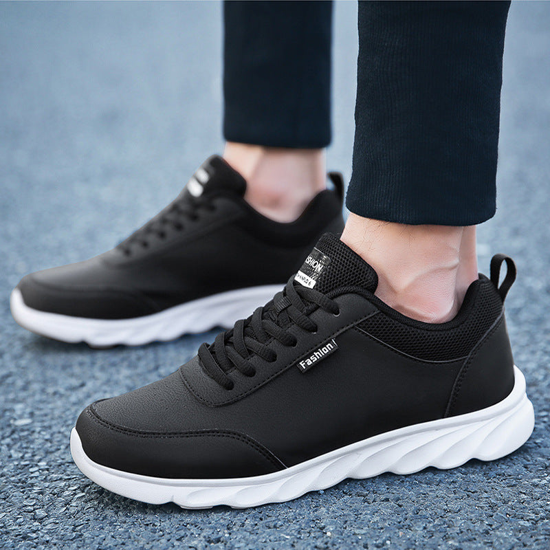Side profile of lightweight men's breathable mesh running sneakers with anti-slip rubber outsoles