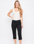 Black mid-rise capri pants featuring a 5-pocket design, side-slit hem, and tummy-control waistband.