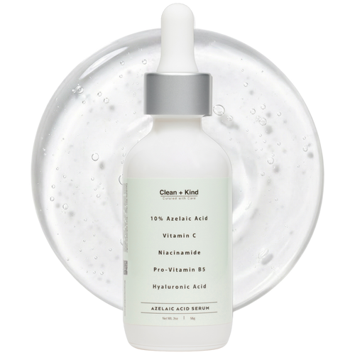 Bottle of 10% Azelaic Acid Face Serum by Clean + Kind with dropper top against a backdrop of clear serum texture.
