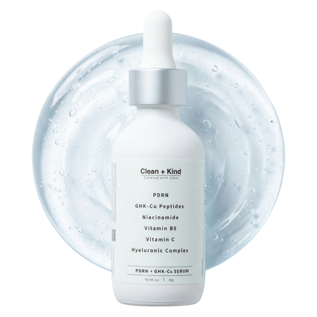 Bottle of Clean + Kind PDRN and GHK-Cu Peptide facial serum against a clear gel backdrop