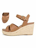 Zelda Wedge sandals in cognac leather with a 3-inch heel and buckle closure.