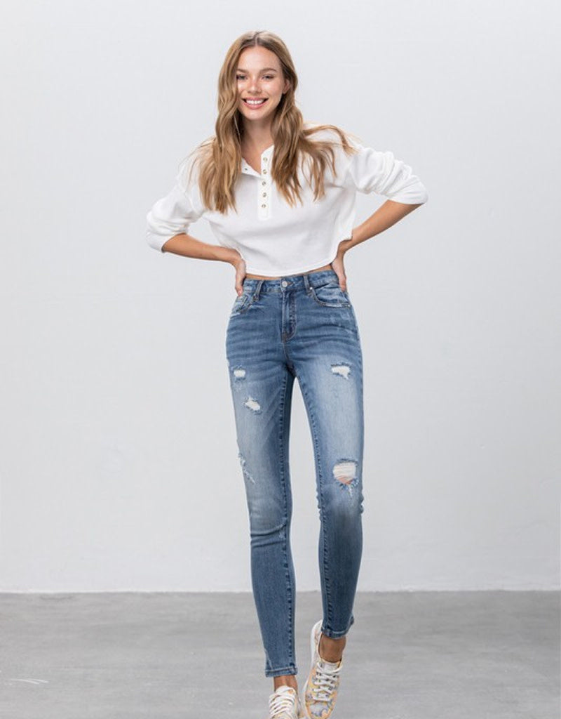 Close up of everyday mid-rise ankle skinny jeans featuring premium cotton-stretch denim.