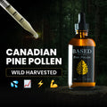 Bottle of Based Supplements Canadian Pine Pollen extract 120ml with a dropper showing liquid on a wooden surface.