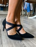 Side profile view of the Missy Heel in black, a classic stiletto high heel