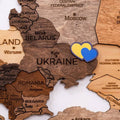 Set of seven Ukrainian blue and yellow fiberboard sticker pins for wooden maps