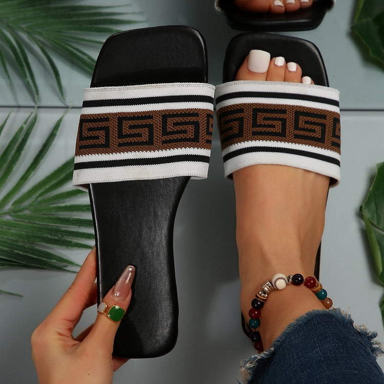Women's minimalist flat slide sandals in geometric pattern with cotton straps