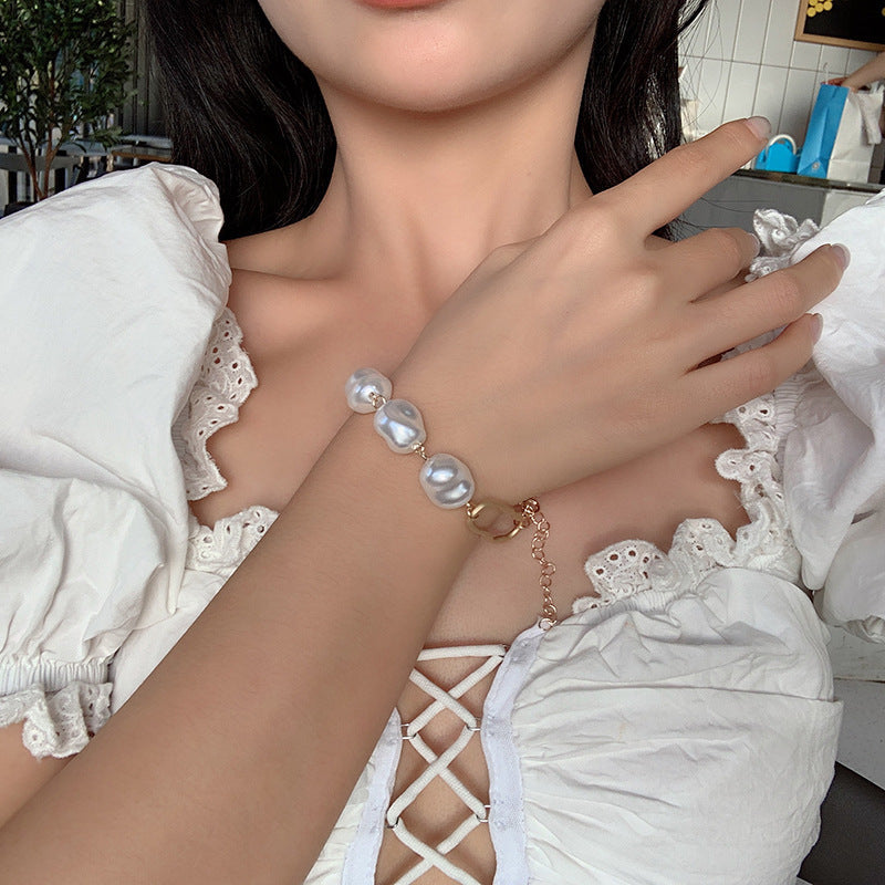 Four-Row Pearl Link Chain Bracelet in Gold-Tone Metal