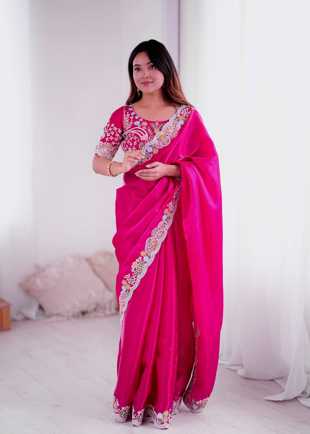 Elegant magenta Jimmy Choo saree with intricate sequins and thread codding embroidery work.