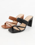 Tan Carmen braided double strap high heel sandals with 3.5-inch heel.