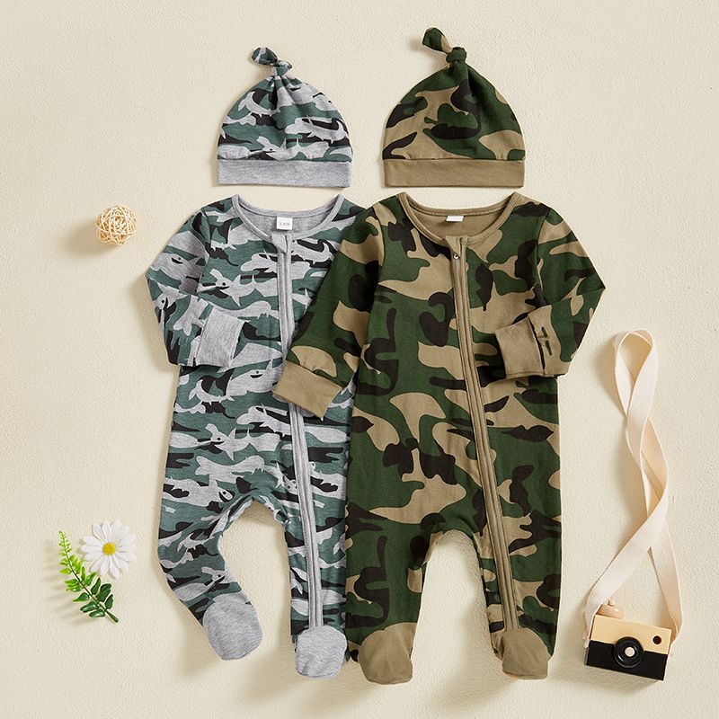 Baby wearing a camouflage military-style long sleeve romper with matching hat and hairband.