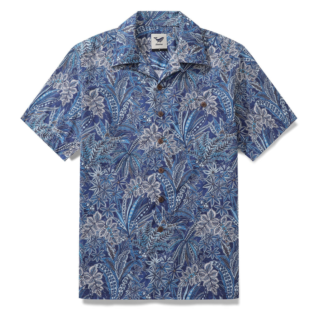 Men's tropical Hawaiian shirt in blue and navy botanical floral print with camp collar.