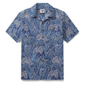 Men's tropical Hawaiian shirt in blue and navy botanical floral print with camp collar.