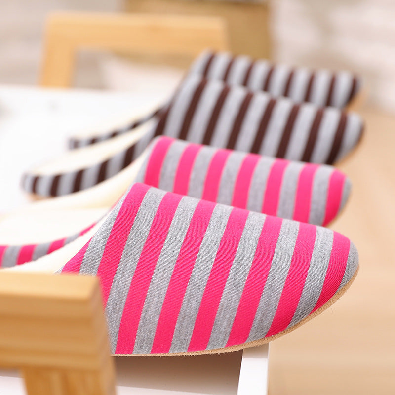 Women's cute rabbit striped house slippers in hot-pink, yellow, and grey with non-slip PVC soles.