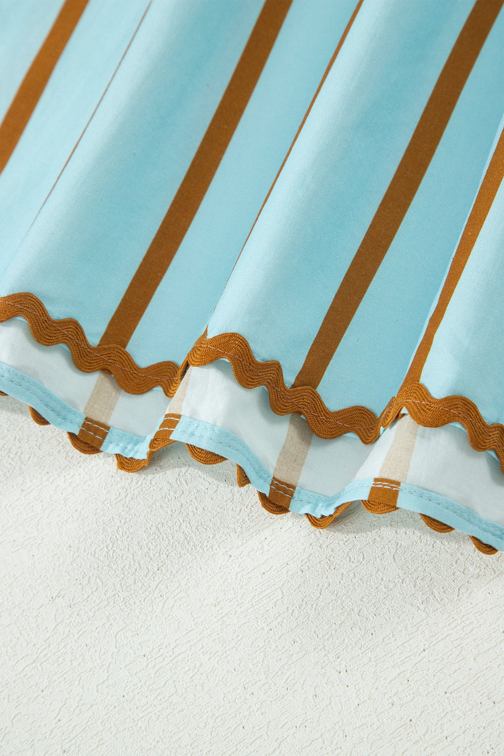 Malaysia Ruffled Short Sleeve Blouse in Light-Blue and Brown
