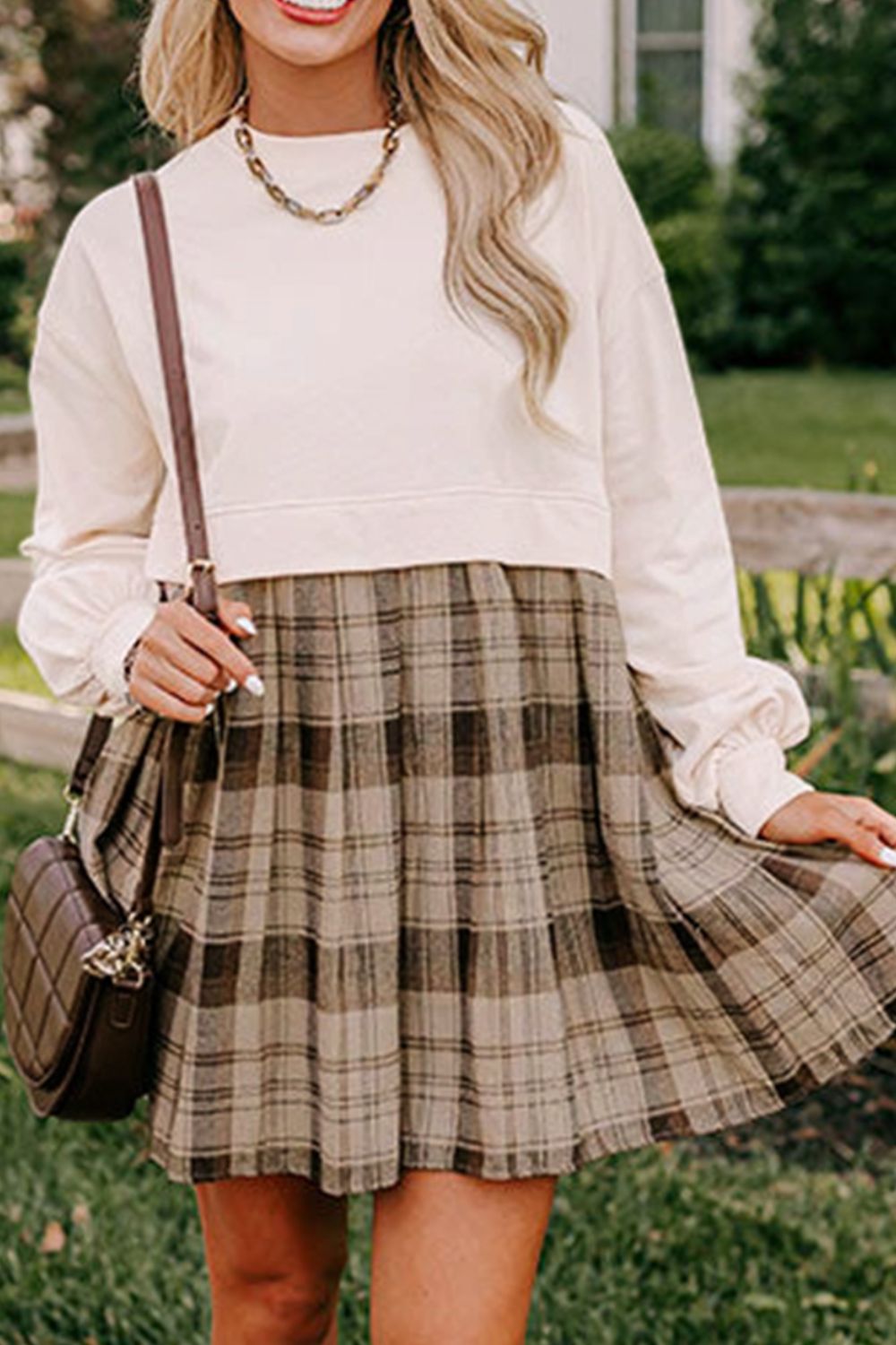 Model wearing a vintage plaid round neck long sleeve mini dress