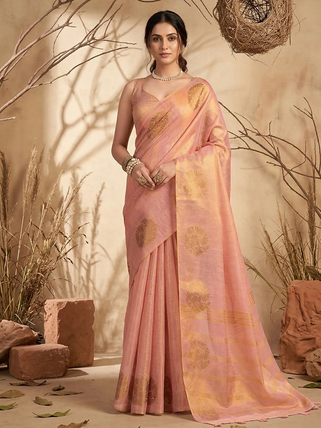 Pink Tissue Silk saree with a subtle metallic sheen and matching blouse