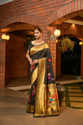 Elegant black Paithani silk saree with luxurious gold zari woven borders and matching blouse.