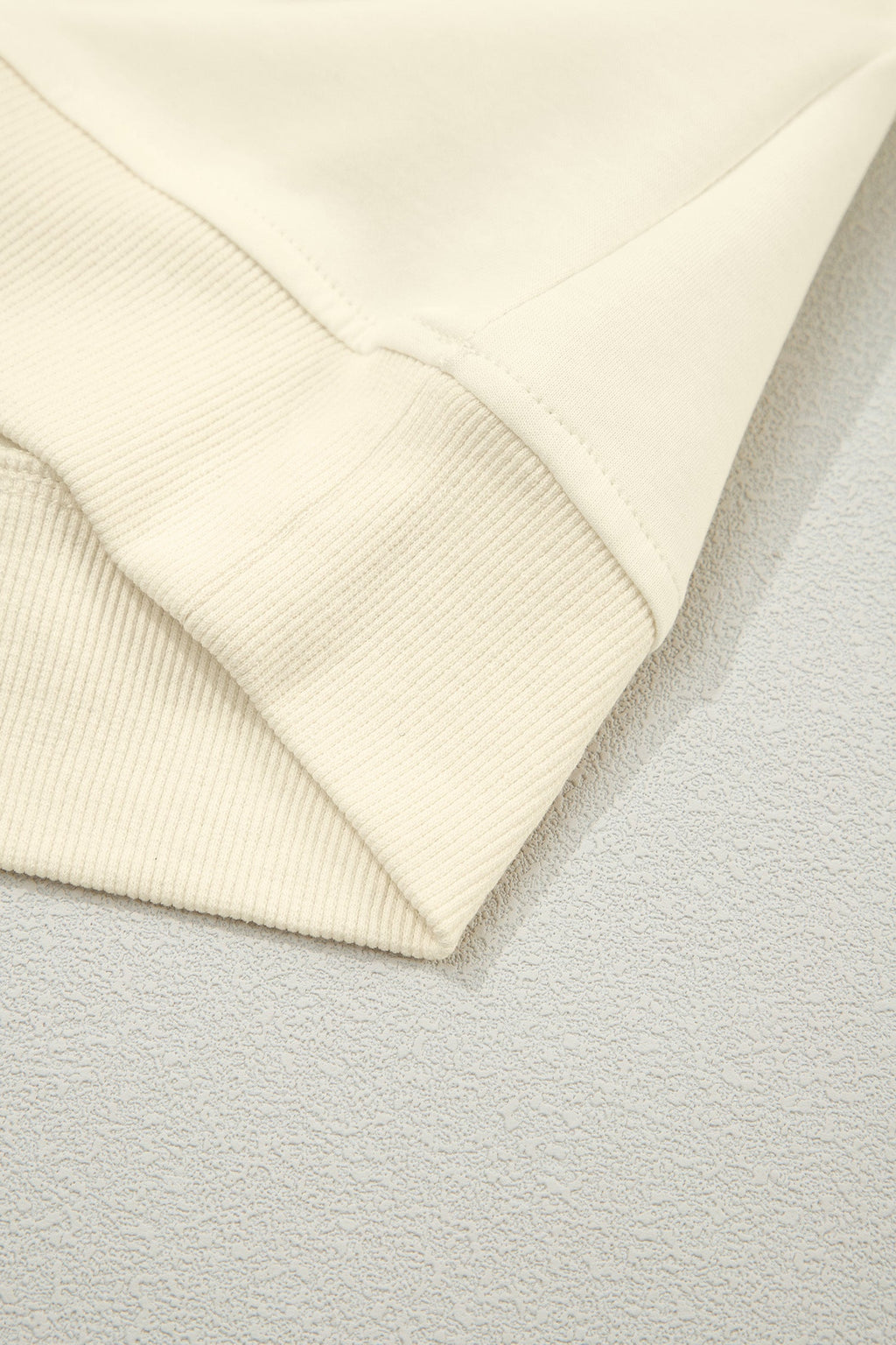 Juniper Ruffled Short Sleeve Blouse in Off-White and Cream