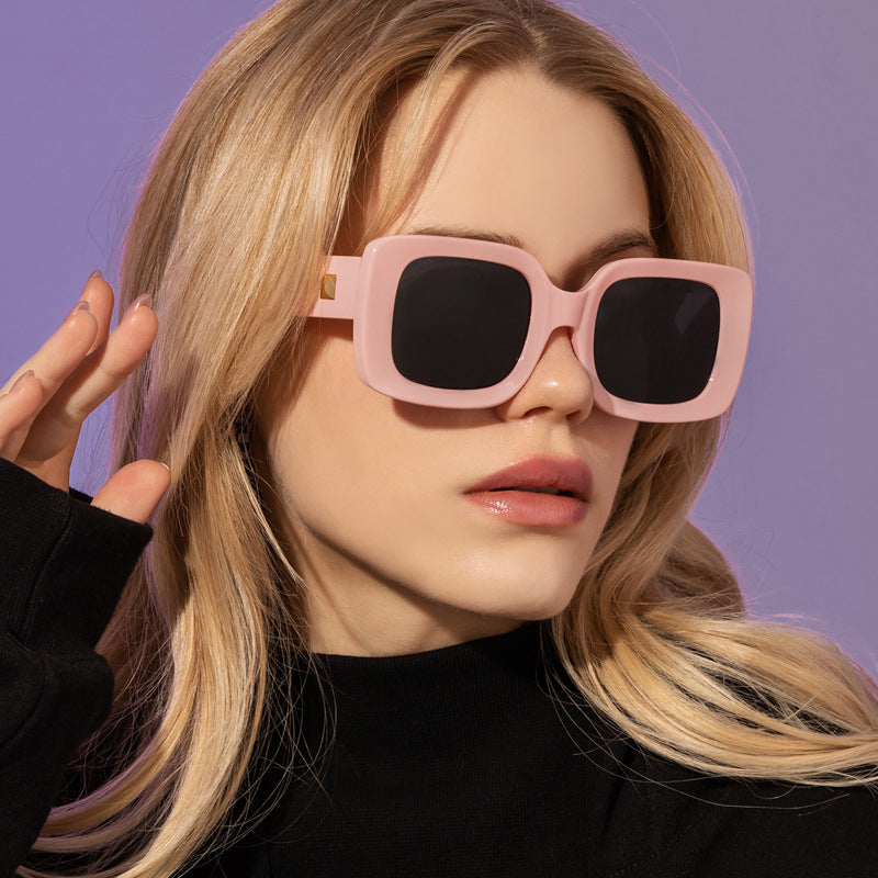 Women's oversized retro square sunglasses available in pink, black, brown, and tortoiseshell.